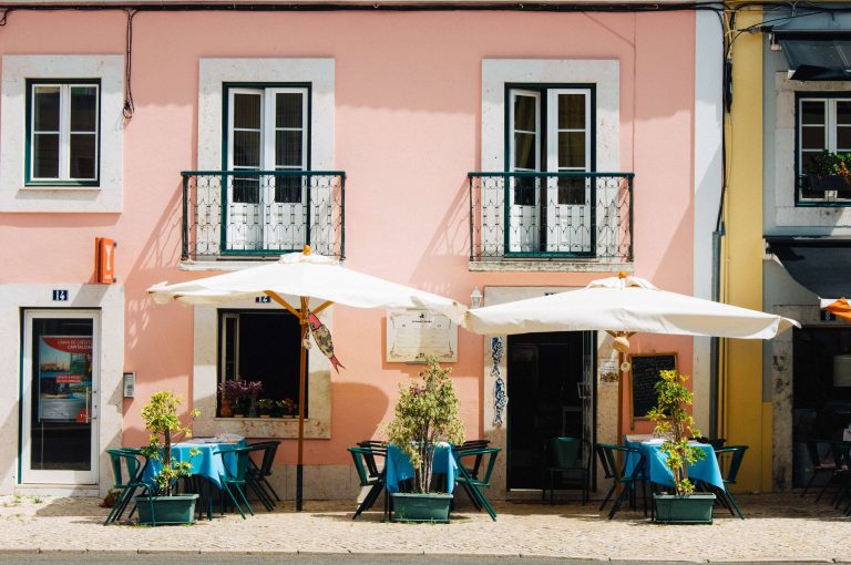 outdoor cafe with umbrellas tables and chairs