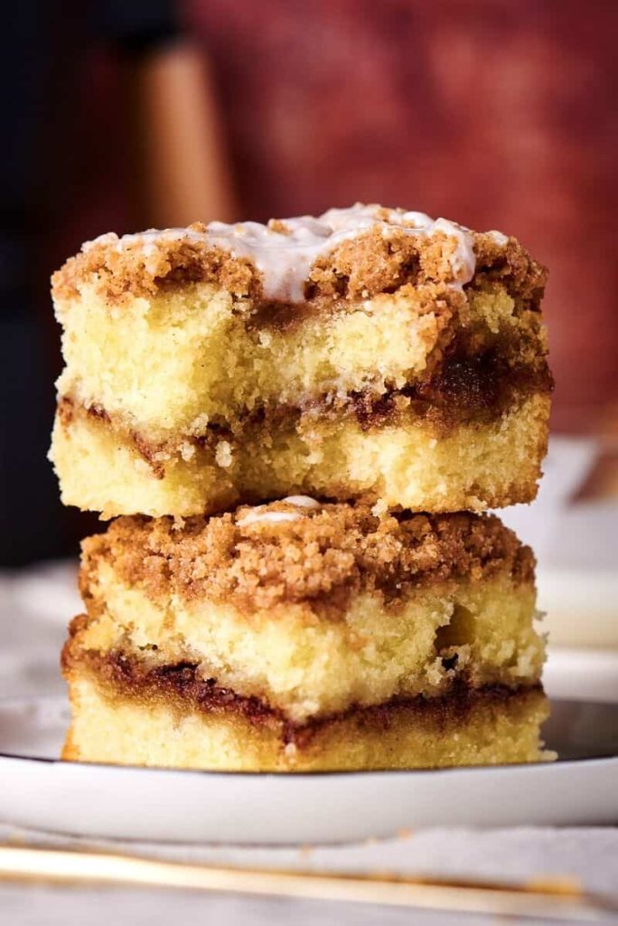 coffee cake stakced on another with a bite taken out