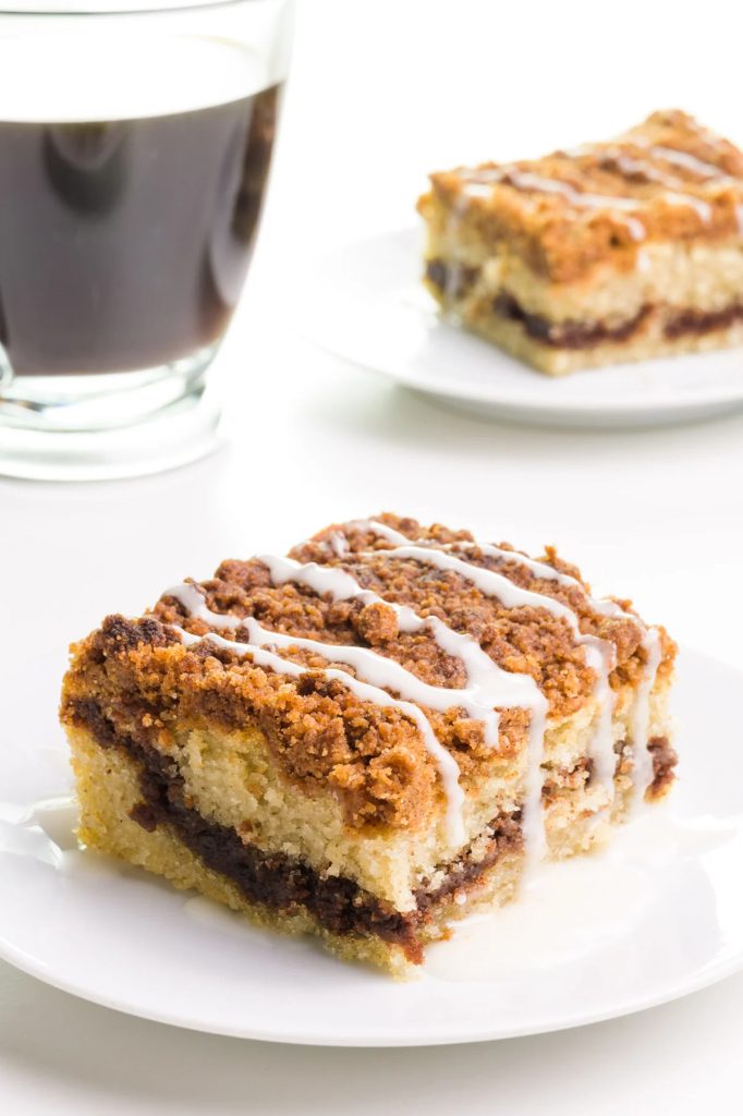 slice of cake with white icing on top