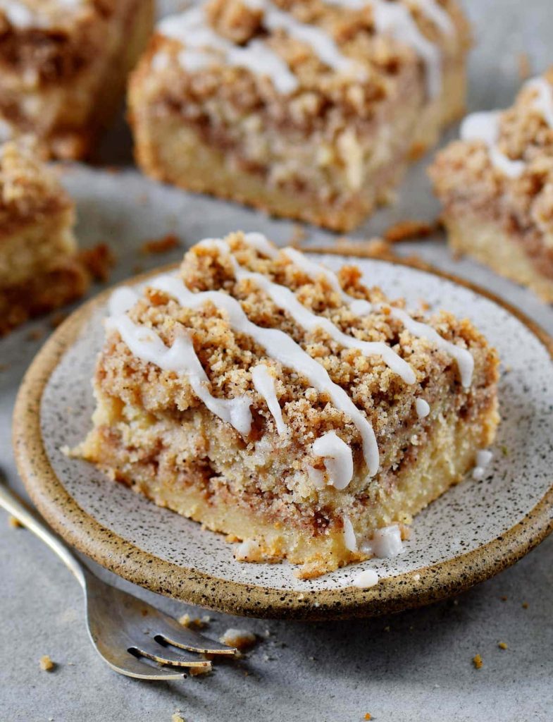 coffee cake with strips of white icing on top