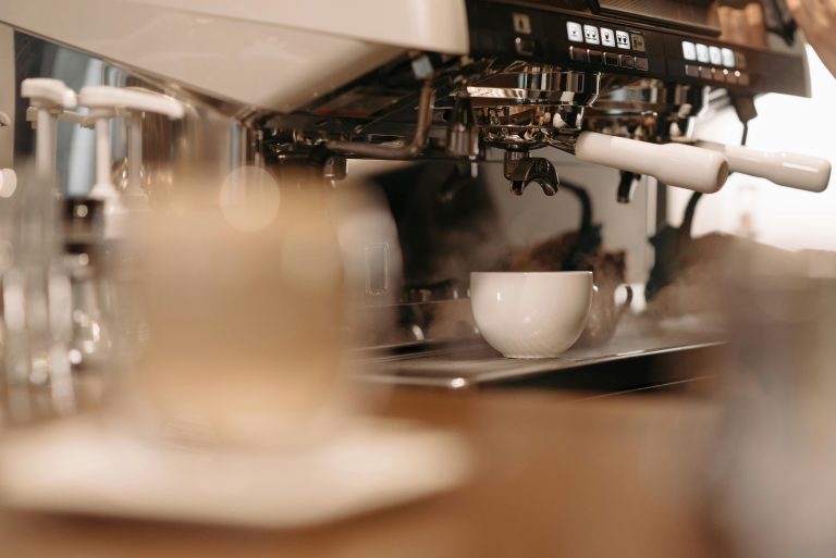 coffee pouring from one of the best italian coffee machine brands