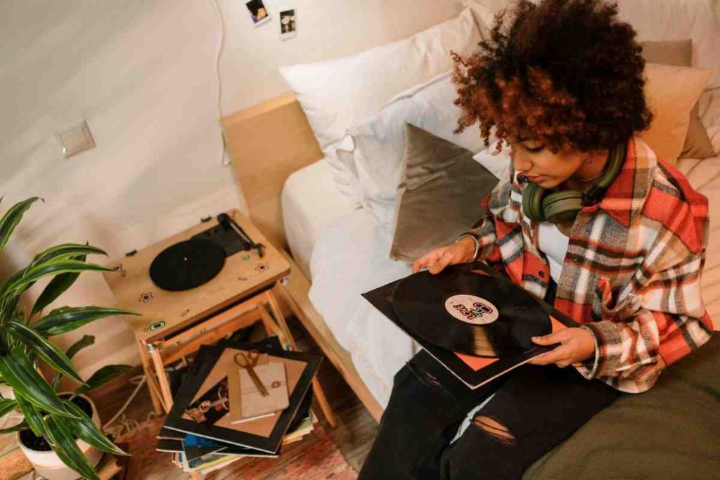woman looking at an album
