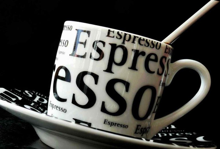 white and black espresso cup