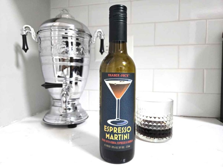 trader joes espresso martini bottle standing next to a glass