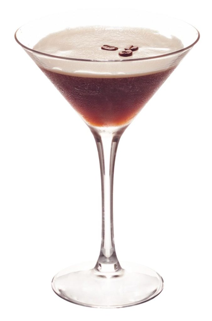 martini glass with foam on top