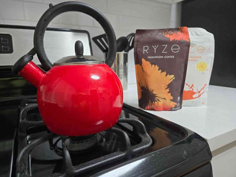 red kettle with package of ryze mushroom coffee