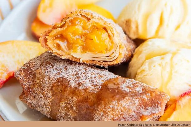 a close up of peach cobbler egg rolls
