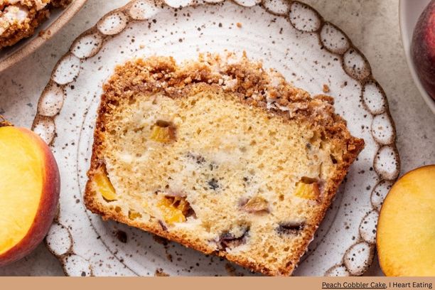 A slice of peach pound loaf on a plate