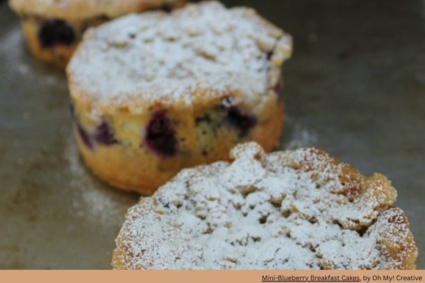 3 mini bundt cakes with a dusting of powdered sugar on top